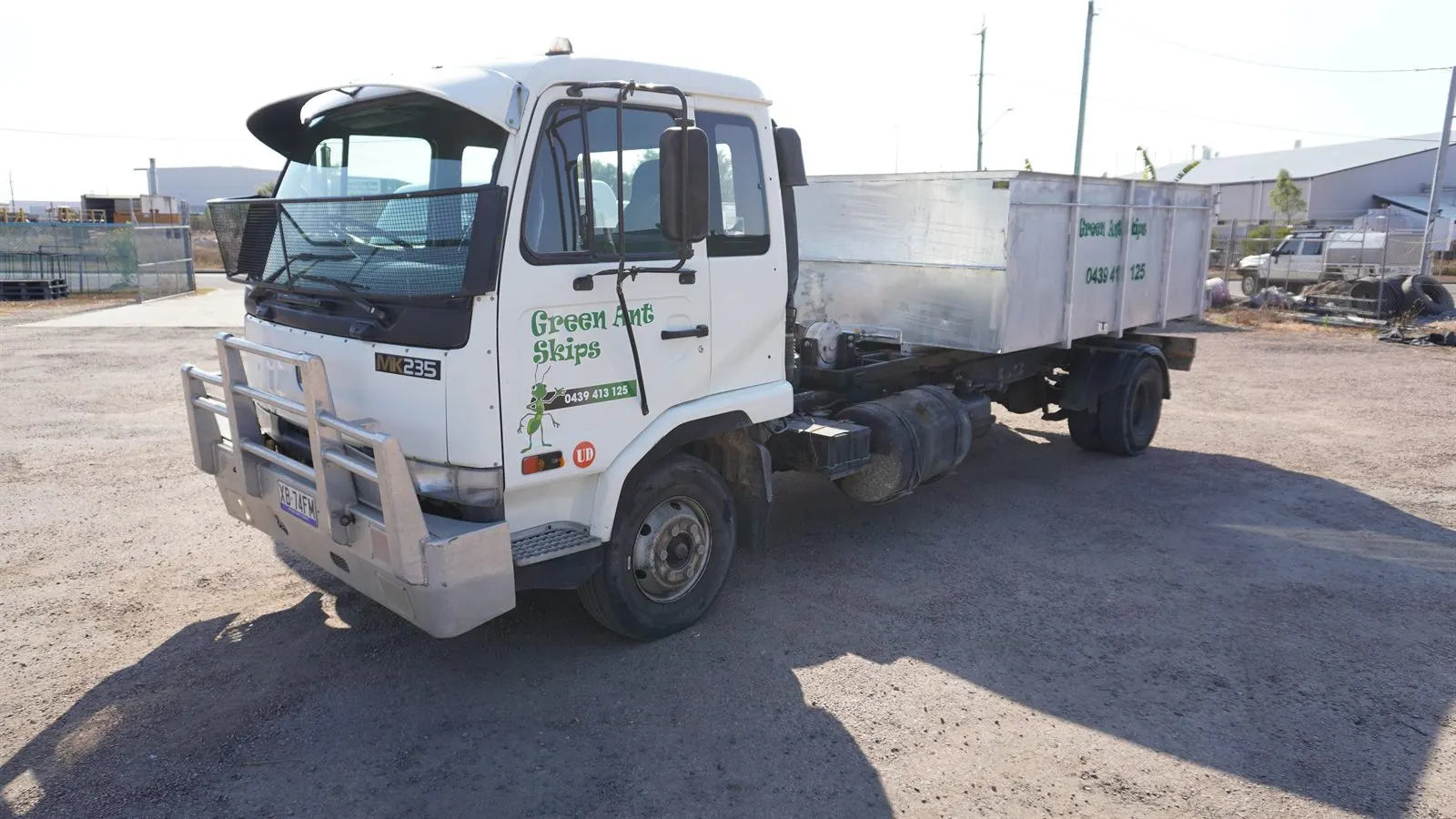 Green Ant Skips hook-lift skip truck